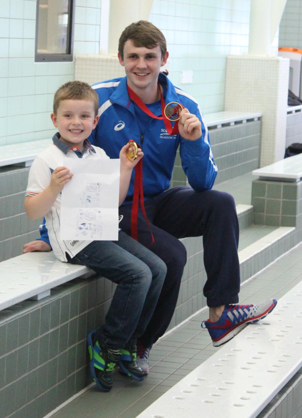 Stirling swimmer Ross Murdoch with the little fan he traced through Twitter, Brian Fitzpatrick.