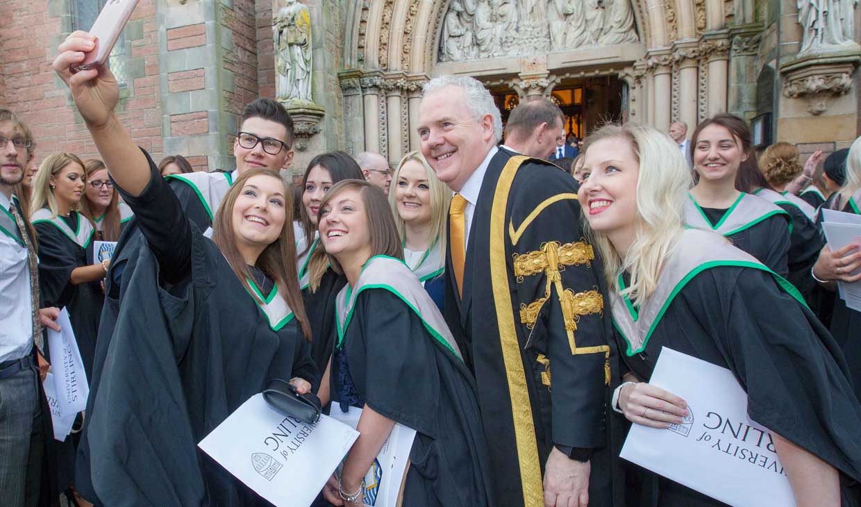 University Vice Chancellor with students at graduation