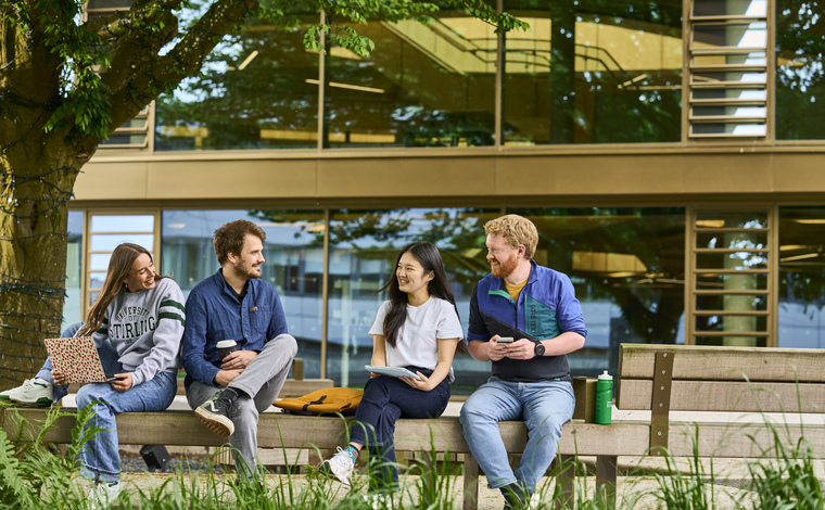 Group of students talking to each other