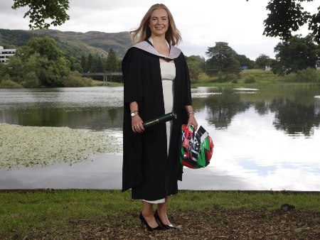 Motor racing driver makes pit stop in Stirling for graduation 