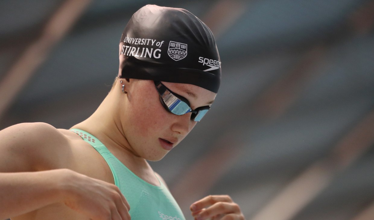 Lucy Grieve is pictured in swim hat and goggles.