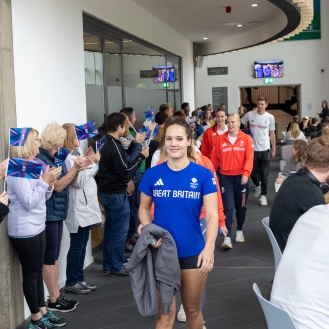 Olympians receive a warm welcome on their return to campus.