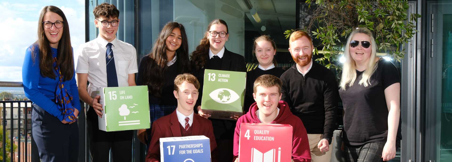 Dr Sasha Saunders (Head of Enterprise, University of Stirling) John Robertson (Enterprise Programme Officer, University of Stirling), and Councillor Fiona Law (Spokesperson for Environment and Net Zero, Clackmannanshire Council) join pupils from schools across Stirling and Clackmannanshire taking part in the fourth Young Pathfinders education outreach programme